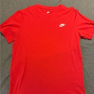 Red Nike shirt
